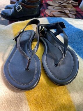 Tory Burch Black Leather T-Strap Sandals with Gold Logo Accent